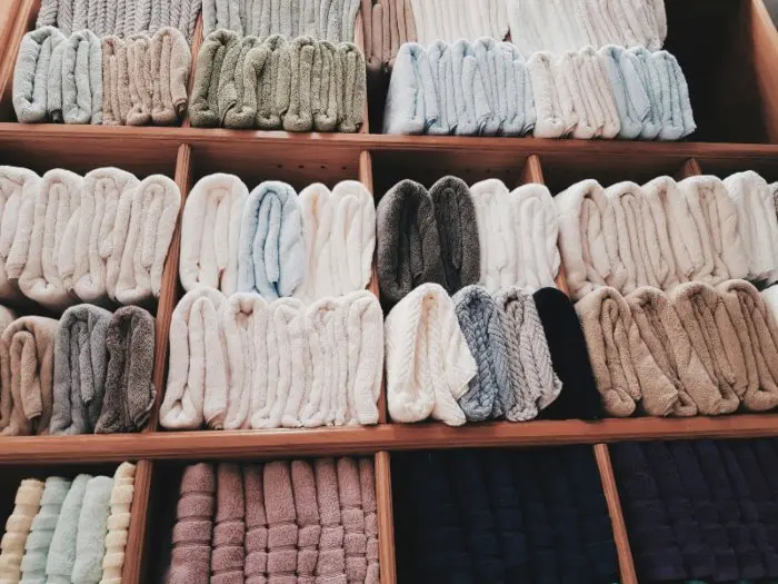 Folded towels on shelves
