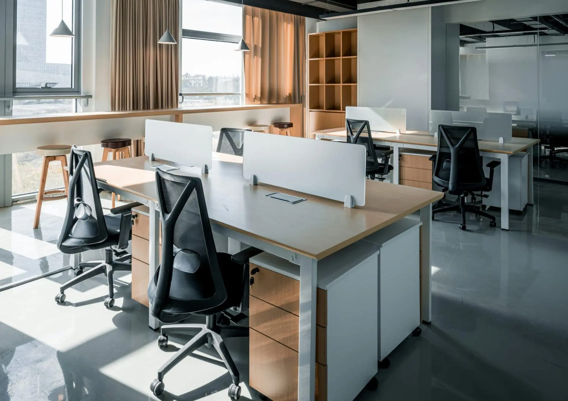 Office with workstations and ergonomic chairs