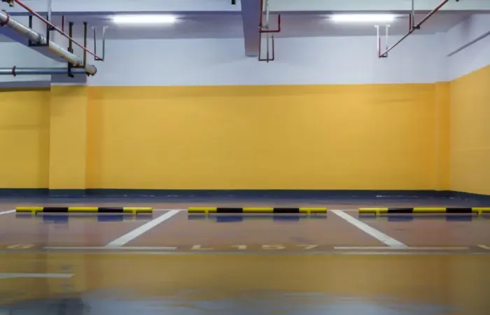 Clean underground car park with painted bays