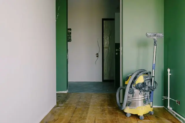 Newly renovated room with an industrial vacuum cleaner