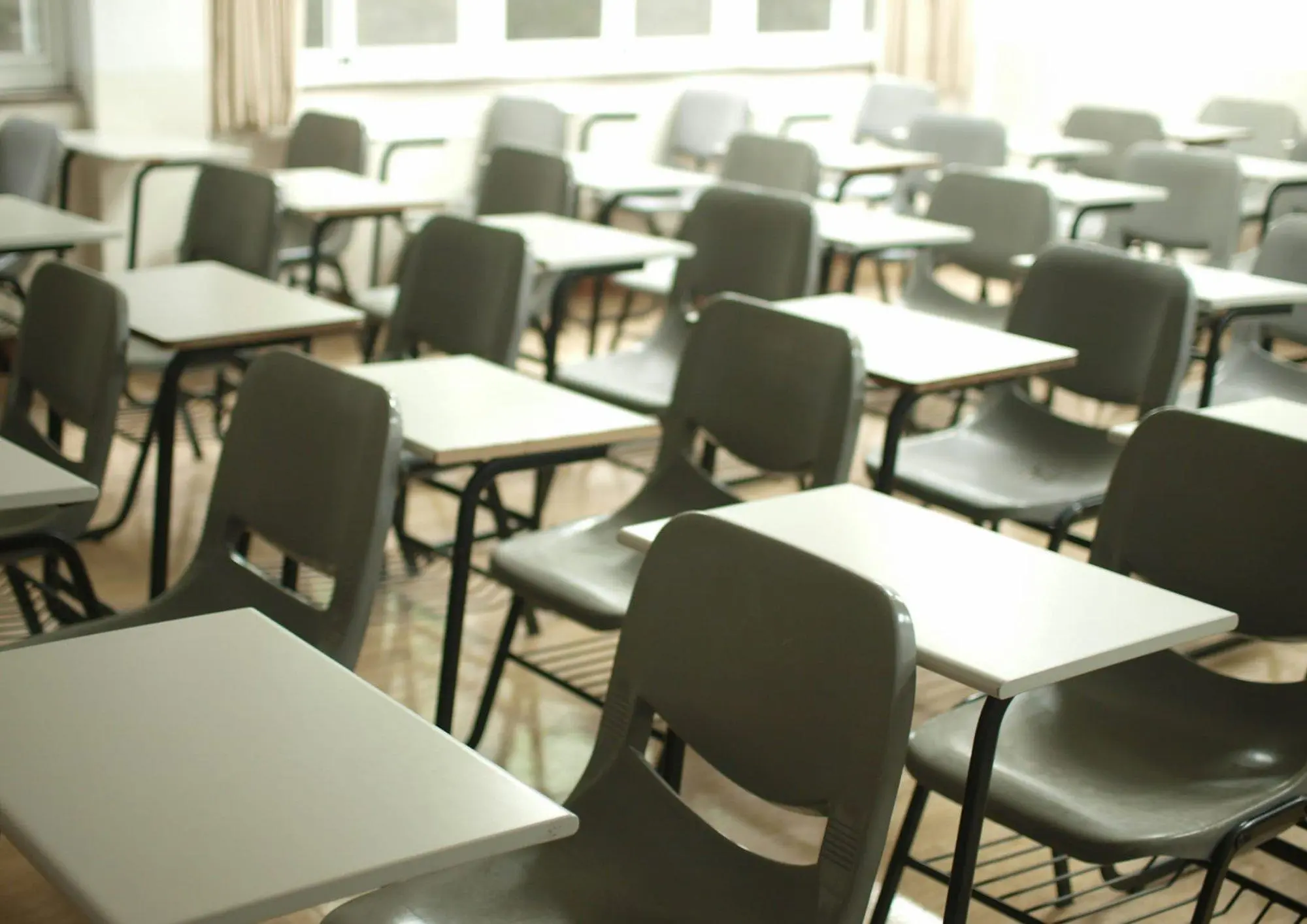 Classroom with rows of desks and chairs